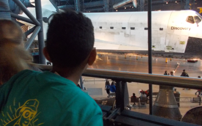 Camper looking at Discovery Shuttle at Udvar-Hazy Center